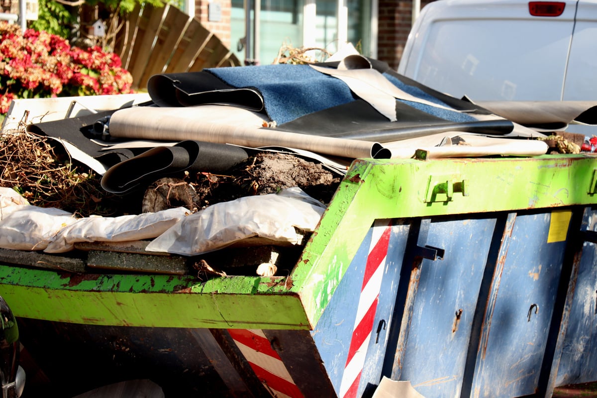 Loaded garbage dumpster